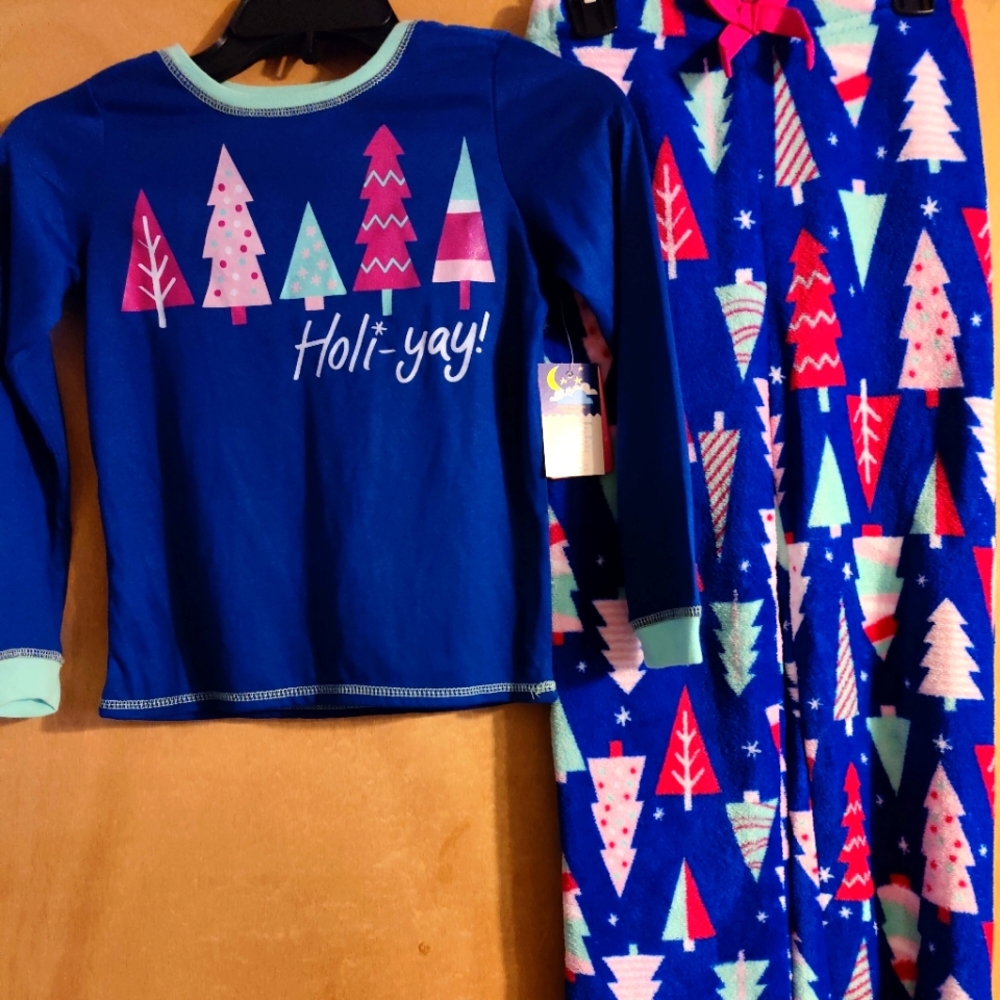 NWT Sz S which I believe is a size 6 to 6x Christmas Pajamas.